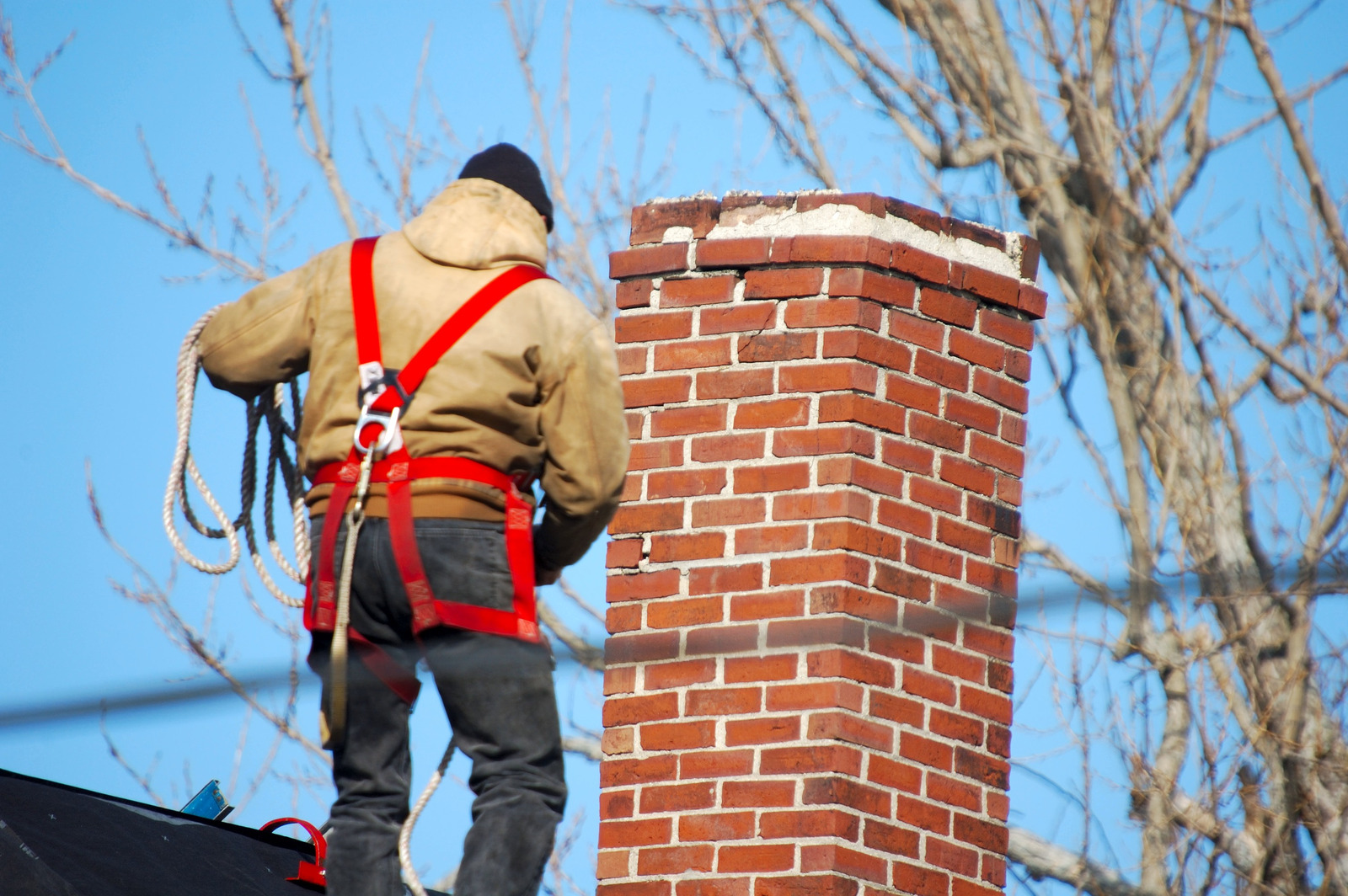 Chimney Cap Replacement on brick chimney